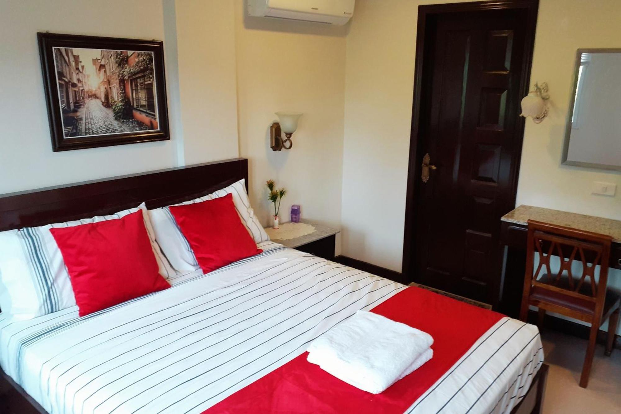 Venezia Suites Hotel Iloilo Habitación foto