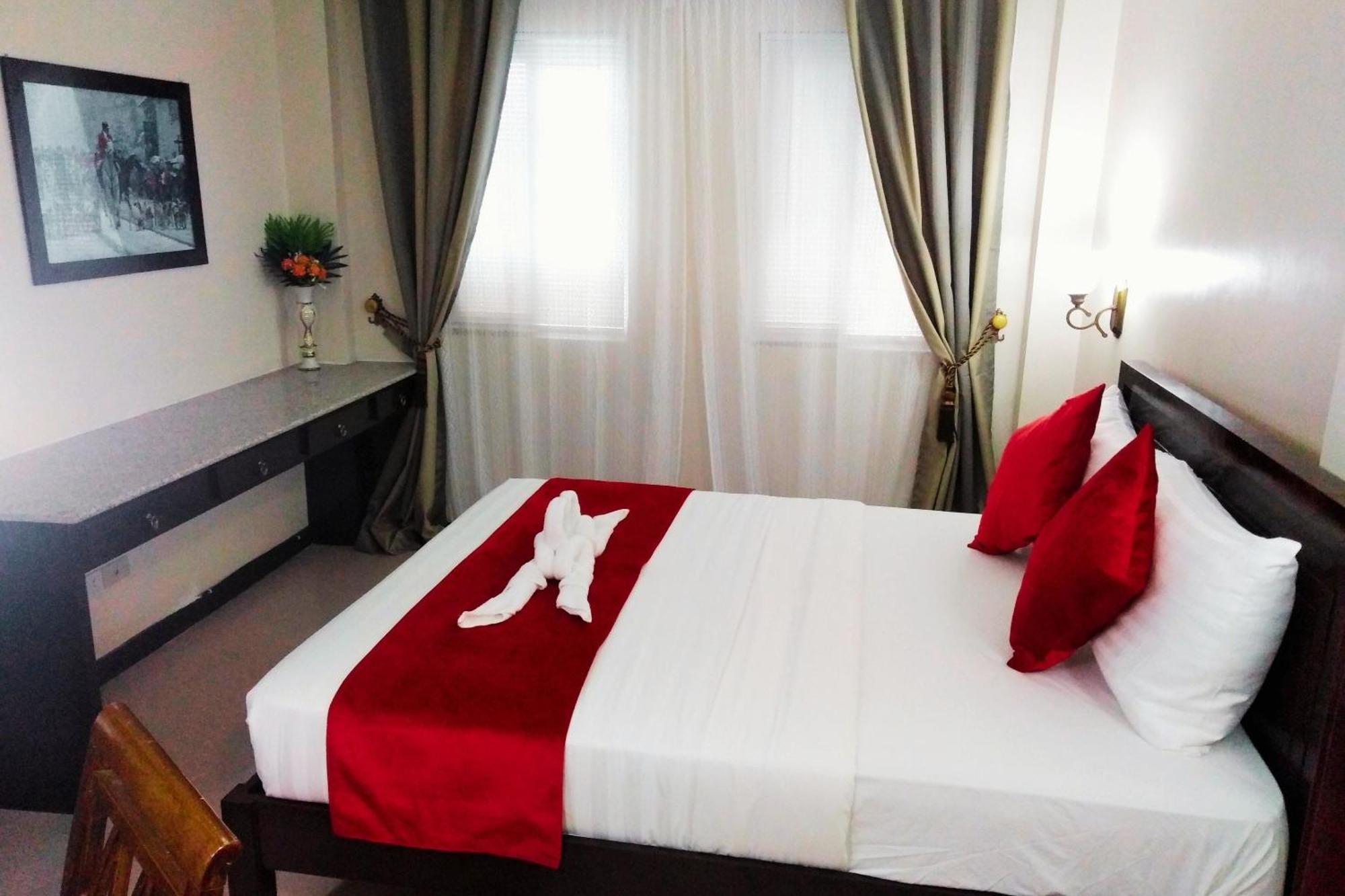 Venezia Suites Hotel Iloilo Habitación foto