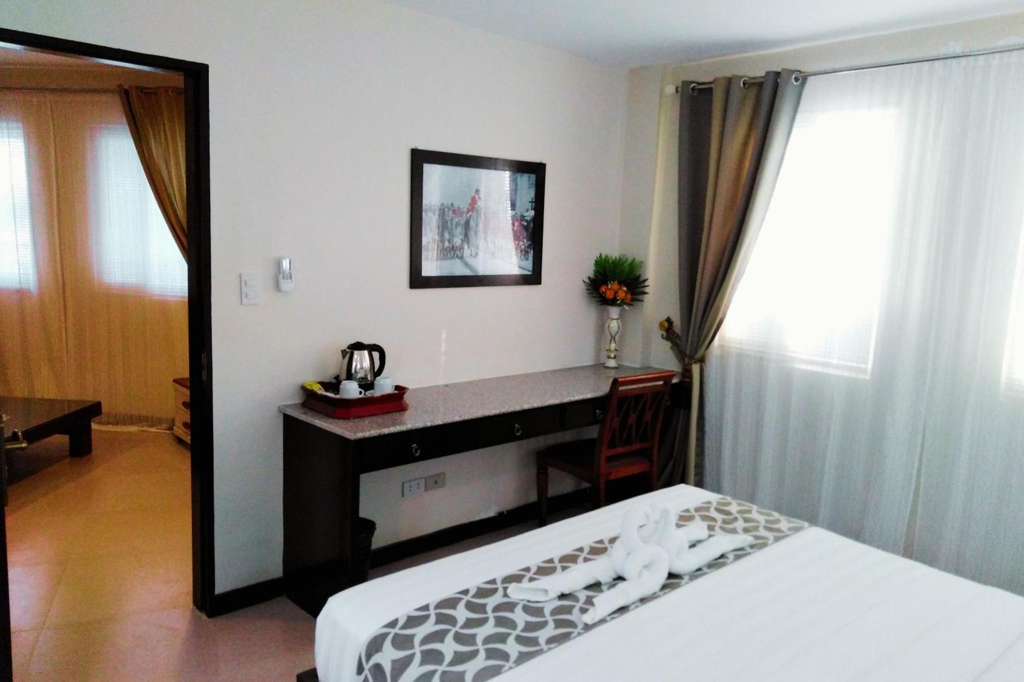 Venezia Suites Hotel Iloilo Habitación foto