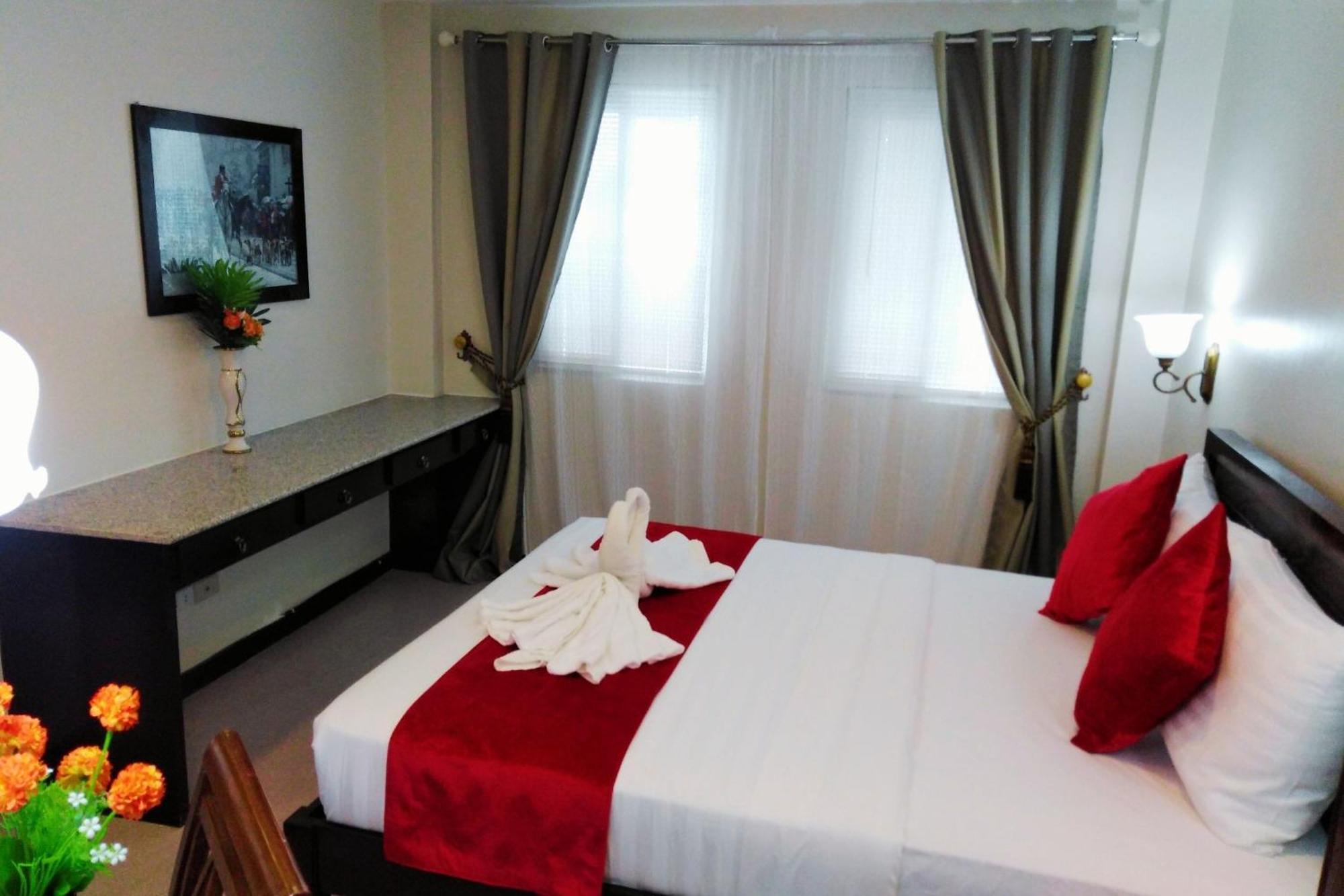 Venezia Suites Hotel Iloilo Habitación foto