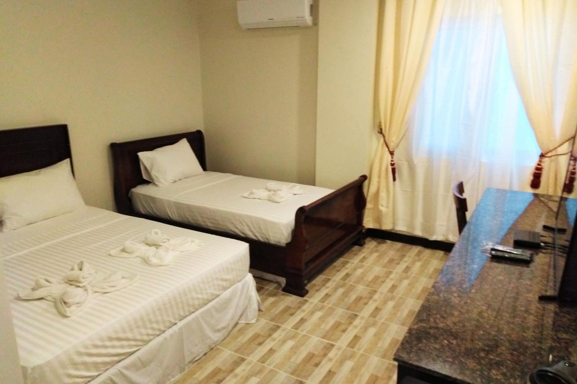 Venezia Suites Hotel Iloilo Habitación foto
