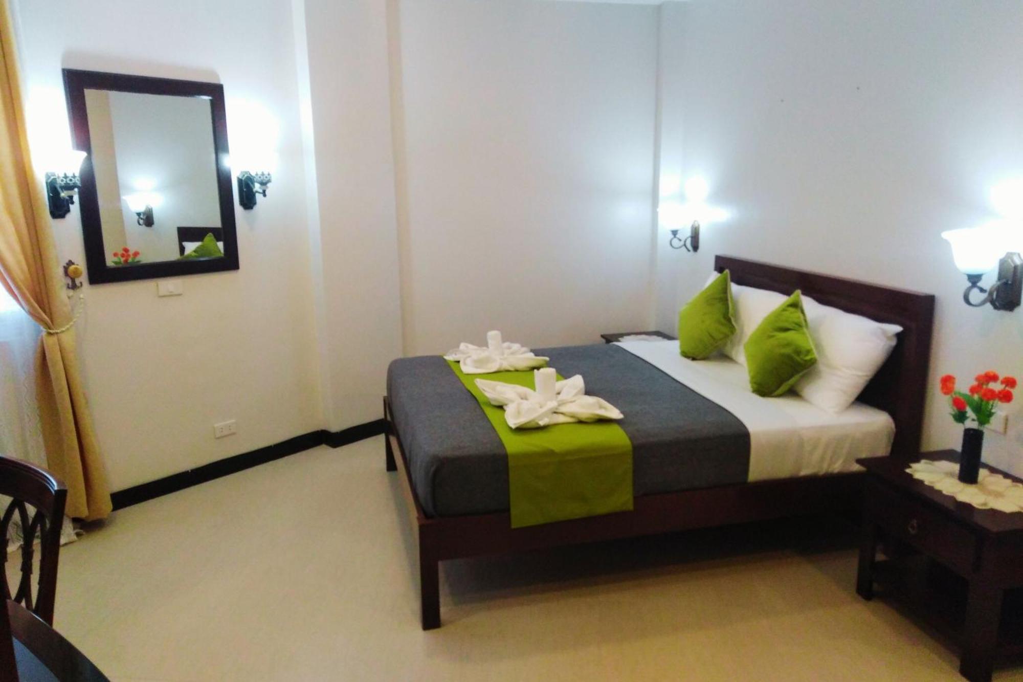 Venezia Suites Hotel Iloilo Habitación foto