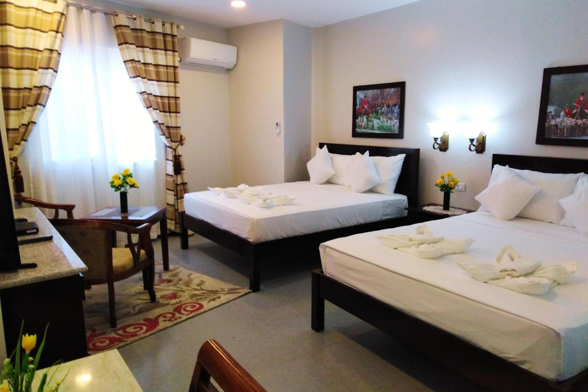 Venezia Suites Hotel Iloilo Habitación foto