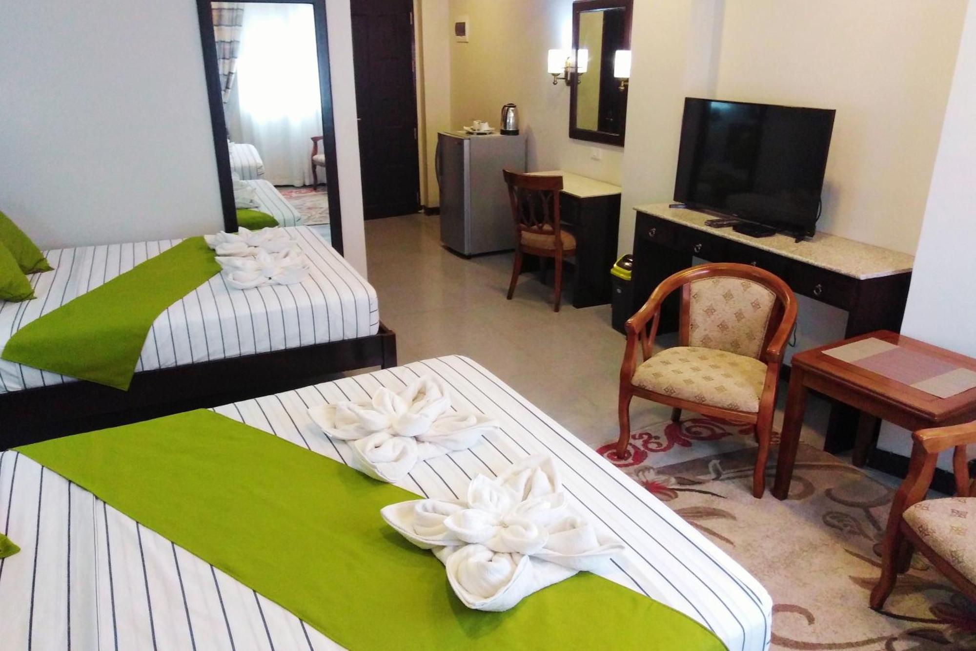 Venezia Suites Hotel Iloilo Habitación foto