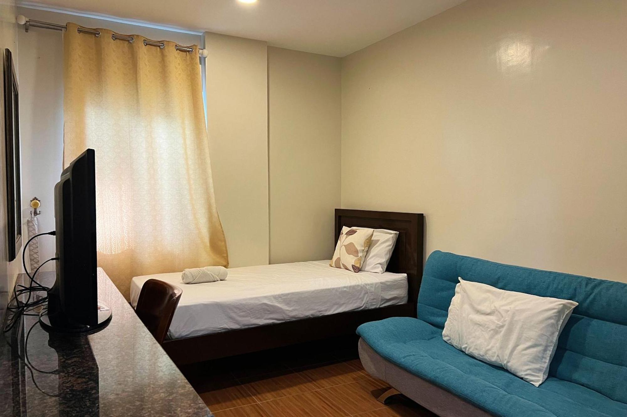 Venezia Suites Hotel Iloilo Habitación foto